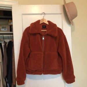 Urban Outfitters burnt orange zip up Teddy Jacket